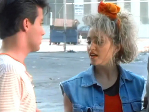 Madonna in a scene from the music video Borderline.